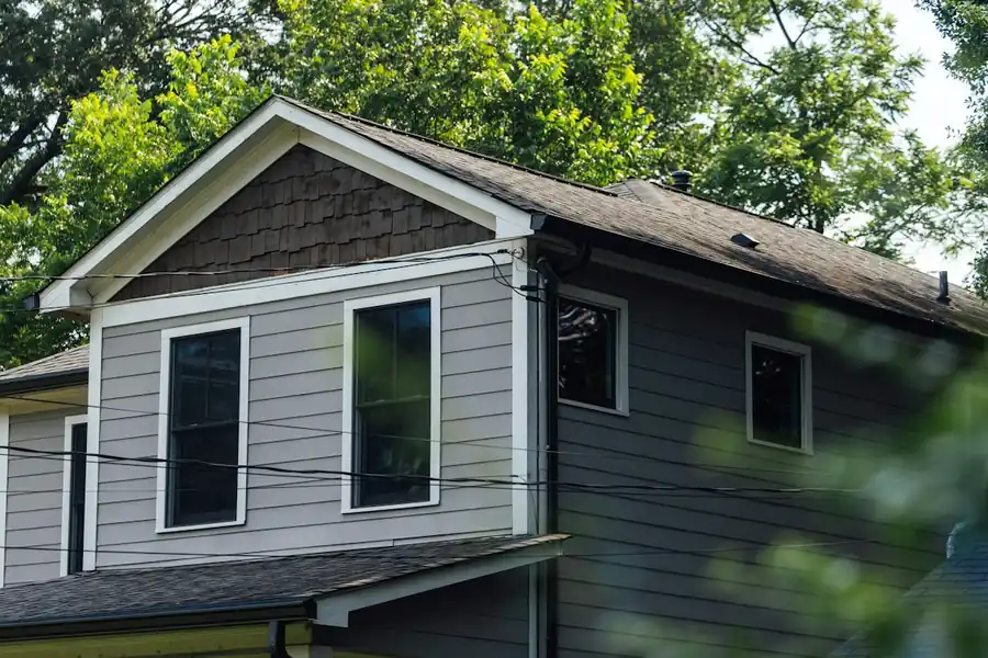 Two-story home exterior with gutters along the roofline